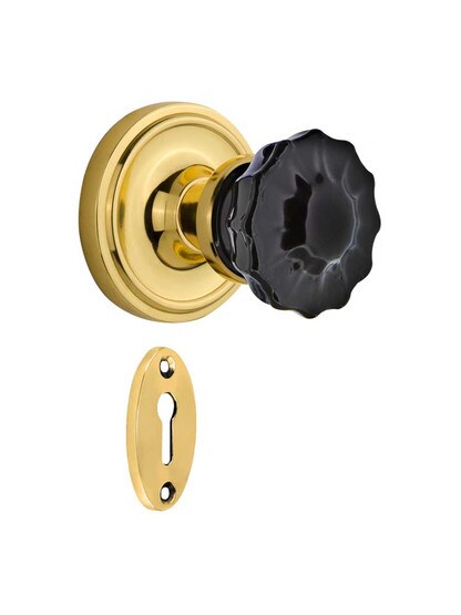 Classic Rosette Mortise Lock Set with Colored Fluted Crystal Glass Knobs Black in Polished Brass.